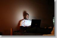Hans Frazilus works on his computer at the  mission house at the Global Outreach Compound Sunday May 2, 2010, in Titanyen Haiti.  Frazilus  is one of  a number of volunteers with the North Carolina Baptist Men Haiti Disaster Relief who are spending a week in country.   ETHAN HYMAN  - ehyman@newsobserver.com