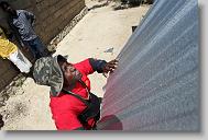 as volunteers with the North Carolina Baptist Men Disaster Relief build houses in Titanyen Haiti Monday May 3, 2010.   ETHAN HYMAN  - ehyman@newsobserver.com