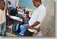 Jeff Joseph, left, hugs and Pierre-Louis Markens after school at the Yahve-Jire Children's Foundation in Tabarre, Haiti Tuesday May 4, 2010.  The orphanage is supported by Western Boulevard Presbyterian Church.  ETHAN HYMAN  - ehyman@newsobserver.com