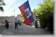 The Haitian flag is raised before school at the Yahve-Jire Children's Foundation in Tabarre,  Haiti Wednesday May 5, 2010.  The orphanage is supported by Western Boulevard Presbyterian Church.  ETHAN HYMAN  - ehyman@newsobserver.com