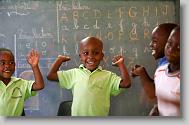 Zikansley Sima (known as Chupa) plays in the kindergarten at the Yahve-Jire Children's Foundation in Tabarre,  Haiti Wednesday May 5, 2010.  The orphanage is supported by Western Boulevard Presbyterian Church.  ETHAN HYMAN  - ehyman@newsobserver.com
