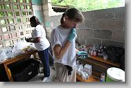 Jane Burian of Youngsville tries to problem solve while figuring out the best way to provide medications during a medical clinic by volunteers with the North Carolina Baptist Men Disaster Relief team in Cabaret, Haiti Friday May 7, 2010.  ETHAN HYMAN  - ehyman@newsobserver.com