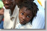 Caroline Otant, 5, waits patiently to be seen during a medical clinic by volunteers with the North Carolina Baptist Men Disaster Relief team in Cabaret, Haiti Friday May 7, 2010.  ETHAN HYMAN  - ehyman@newsobserver.com
