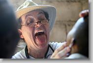 Dr. Bill Harden of Rocky Mount checks of Noel Diovaine, 6, during a medical clinic by volunteers with the North Carolina Baptist Men Disaster Relief team in Cabaret, Haiti Friday May 7, 2010.  ETHAN HYMAN  - ehyman@newsobserver.com