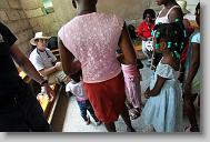 Dr. Bill Harden talks with patients during a medical clinic by volunteers with the North Carolina Baptist Men Disaster Relief team in Cabaret, Haiti Friday May 7, 2010.  ETHAN HYMAN  - ehyman@newsobserver.com