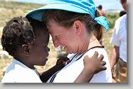 Anne Ross gets close with Sandia Joseph, 4, during the last day  of working in Titanyen for this group of the North Carolina Baptist Men Disaster Relief team in Titanyen, Haiti Friday May 7, 2010.  ETHAN HYMAN  - ehyman@newsobserver.com