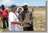 Chris Yarboro of Roxboro says goodbye to Elie Joseph Ronald during the last day of working in Titanyen for this group of the North Carolina Baptist Men Disaster Relief team in Titanyen, Haiti Friday May 7, 2010.  ETHAN HYMAN  - ehyman@newsobserver.com
