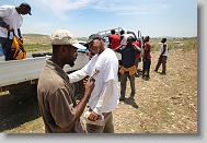 Tru Pettigrew of Cary says goodbye to Elie Joseph Ronald during the last day  of working  in Titanyen for this group of the North Carolina Baptist Men Disaster Relief team in Titanyen, Haiti Friday May 7, 2010.  ETHAN HYMAN  - ehyman@newsobserver.com