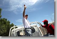 Larry Kingsley of Cary waves goodbye as they depart during the last day  of working in Titanyen for this group of the North Carolina Baptist Men Disaster Relief team in Titanyen, Haiti Friday May 7, 2010.  ETHAN HYMAN  - ehyman@newsobserver.com